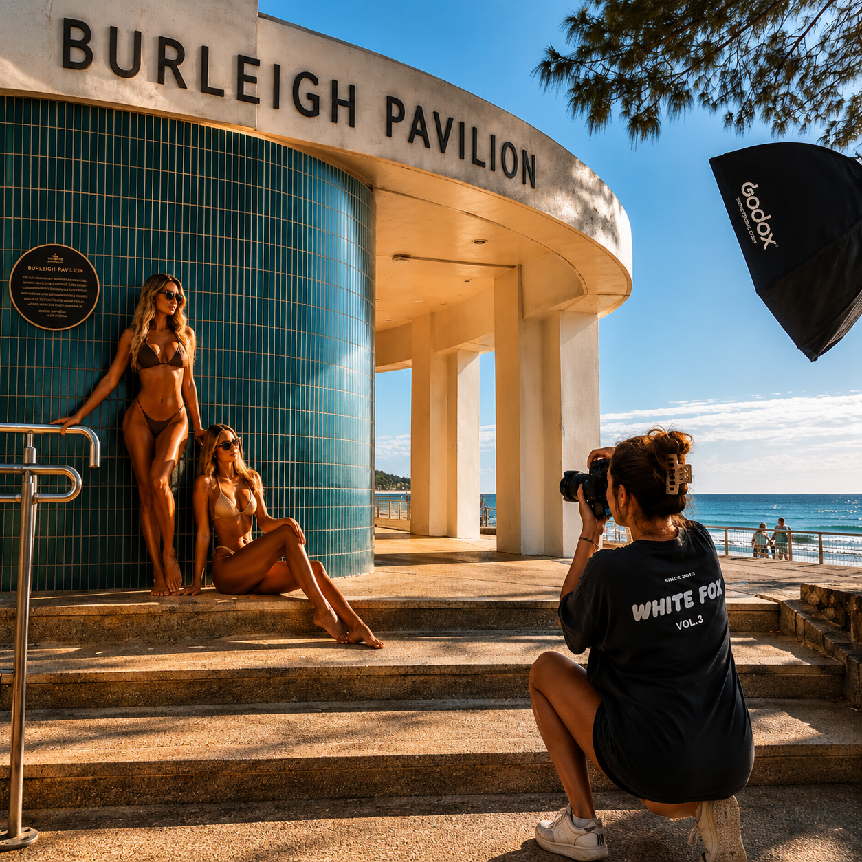 Gold Coast Tanning lifestyle photoshoot at Burleigh Pavilion featuring models posing by the beachfront on the Gold Coast.